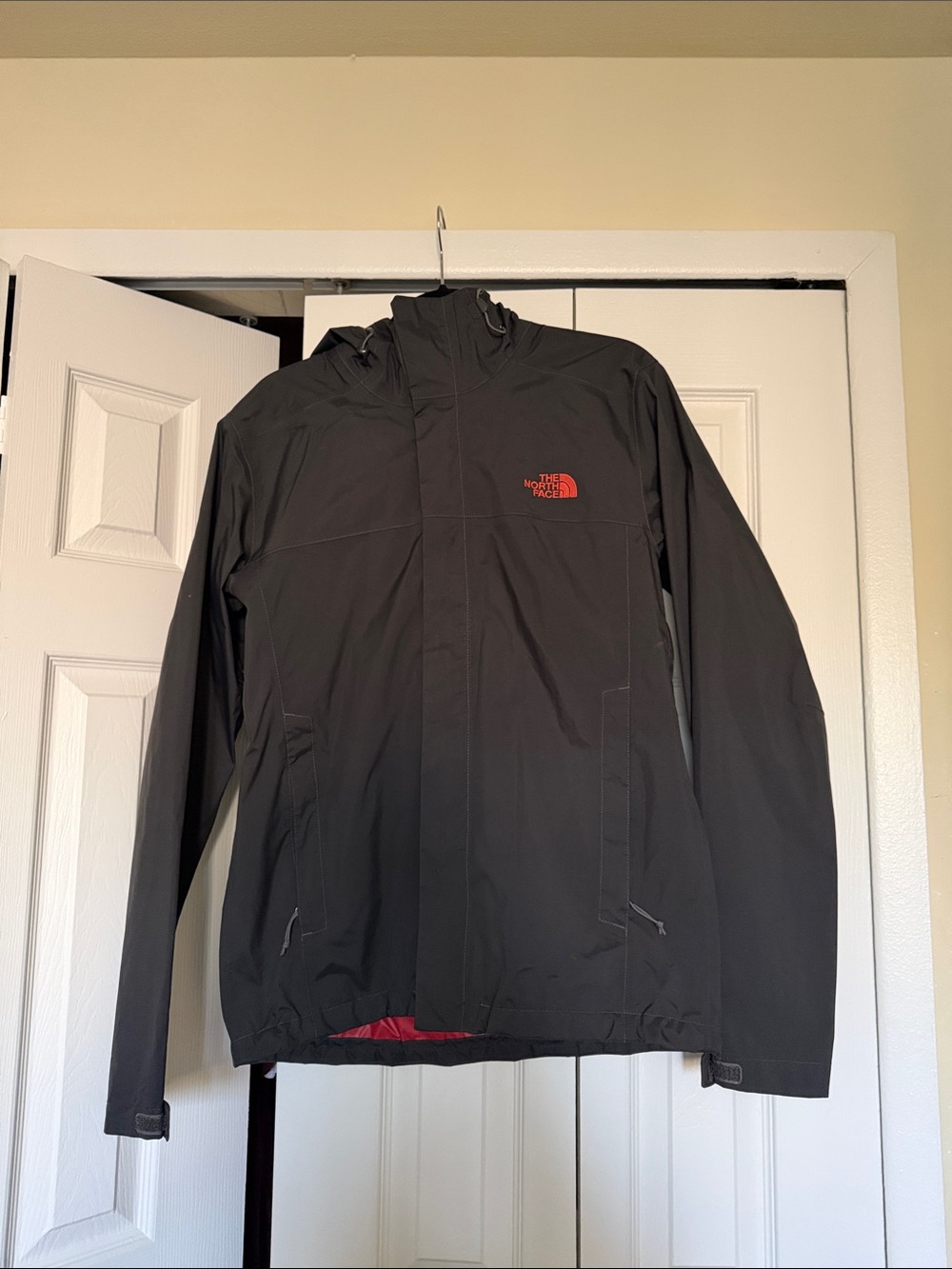 The North Face Men’s Black Rain Jacket with Red Logo